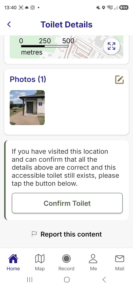 A toilet’s page viewed by another wheeler, with a Confirm Toilet button and a Report this content link